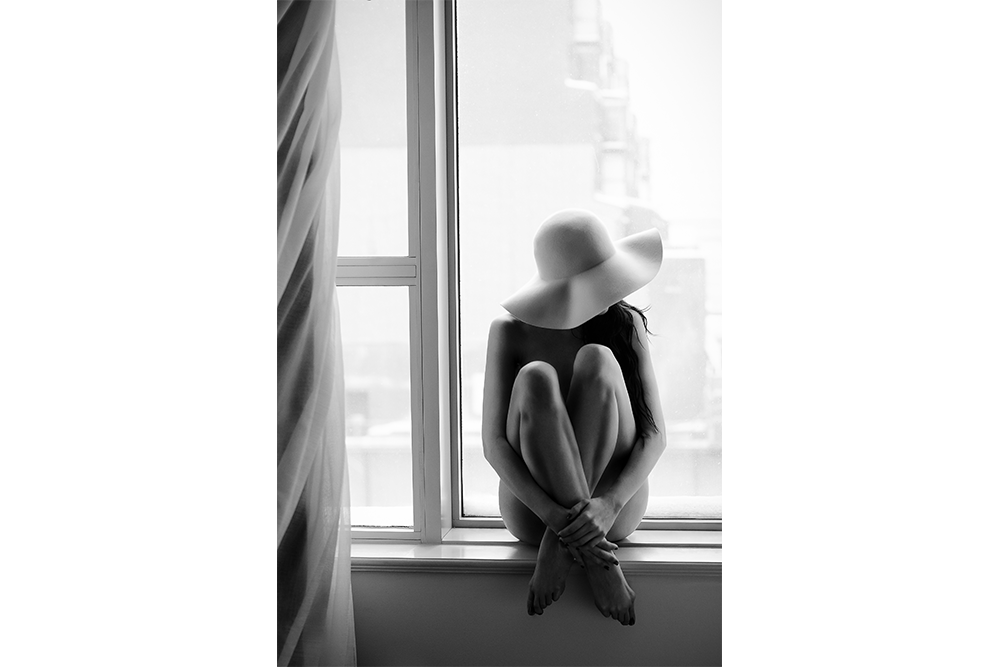 Woman by a Window