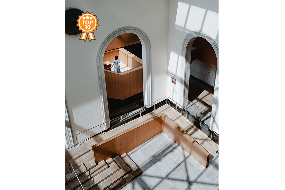 Girl wandering down staircase