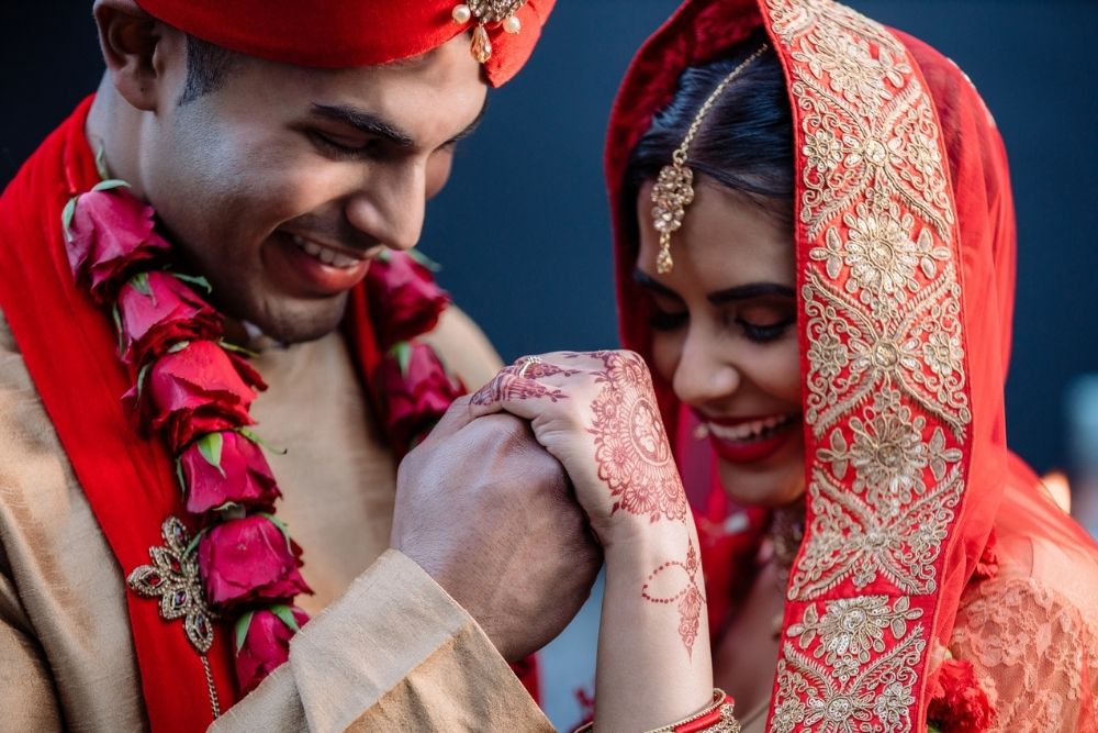 Couple In Cultural Wedding Attire