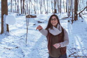 Lady throwing a snowball