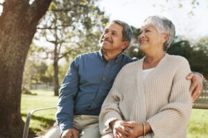 Man And Woman On A Bench