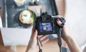 Lady photographing food