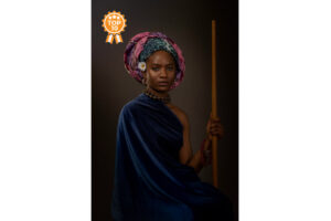 Tribal girl holding stick