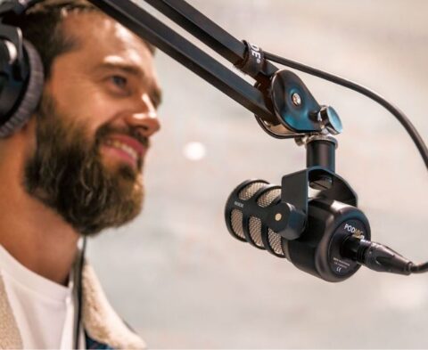 Man with a microphone and earphones