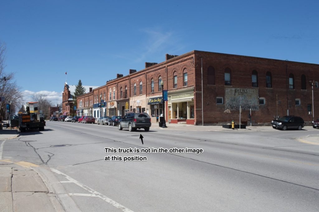 Image 2 shows an image similar to image 1 but with a unique vehicle in another positioning than image 1.